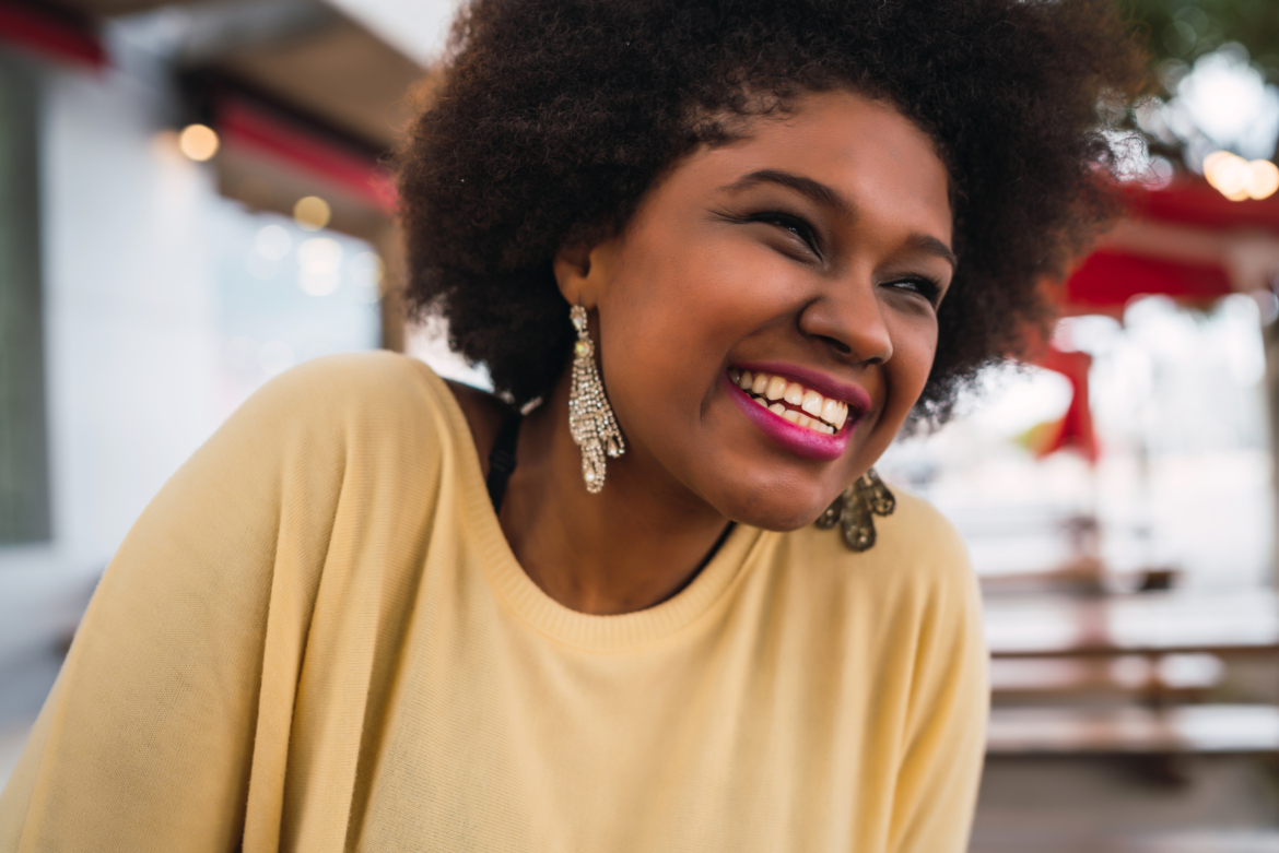 close-up-of-beautiful-afro-american-latin-woman-smiling-and-spending-nice-time-at-the-coffee-shop-1-scaled.jpg